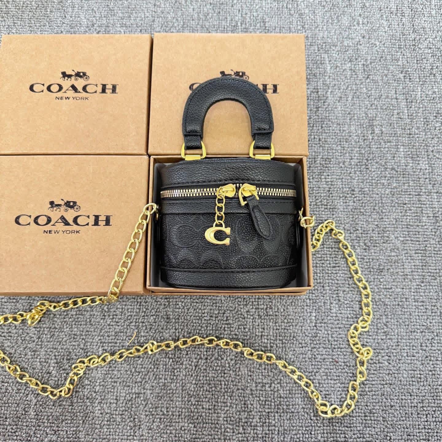 black textured Coach