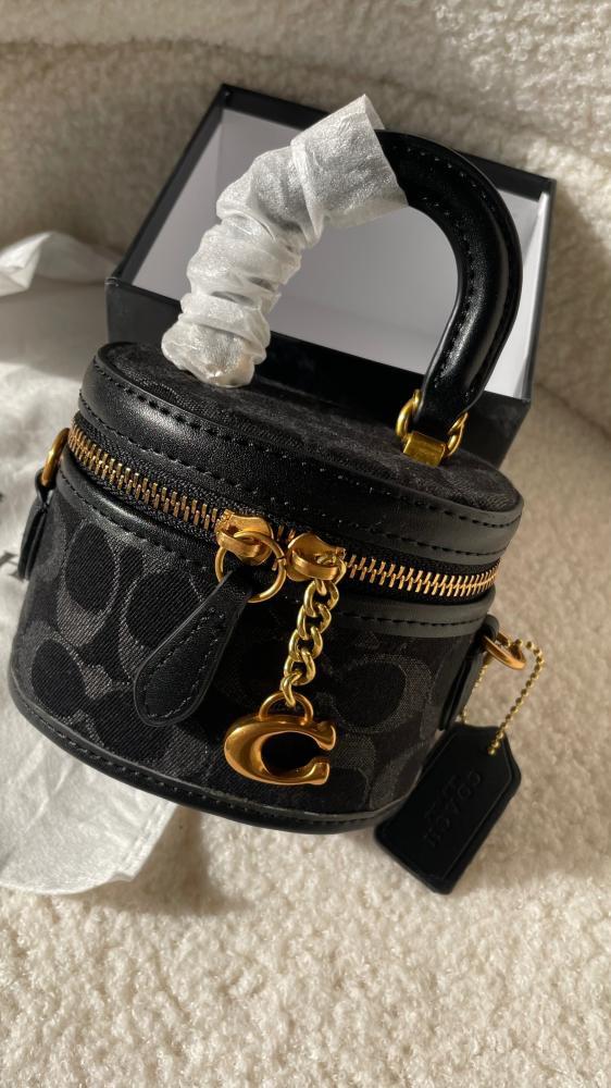 black textured Coach