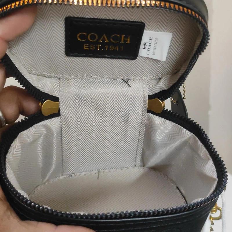 black textured Coach