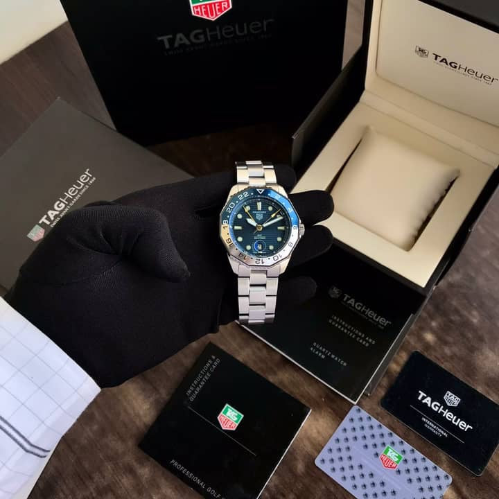 TAG Heuer Aquaracer Professional 300 GMT Blue Basel & Silver Chain Automatic Mens Watch